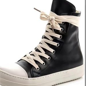 Worn once with extra pair of laces